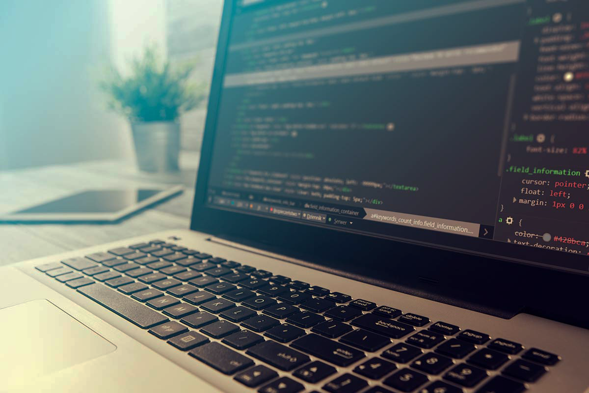 A laptop with code